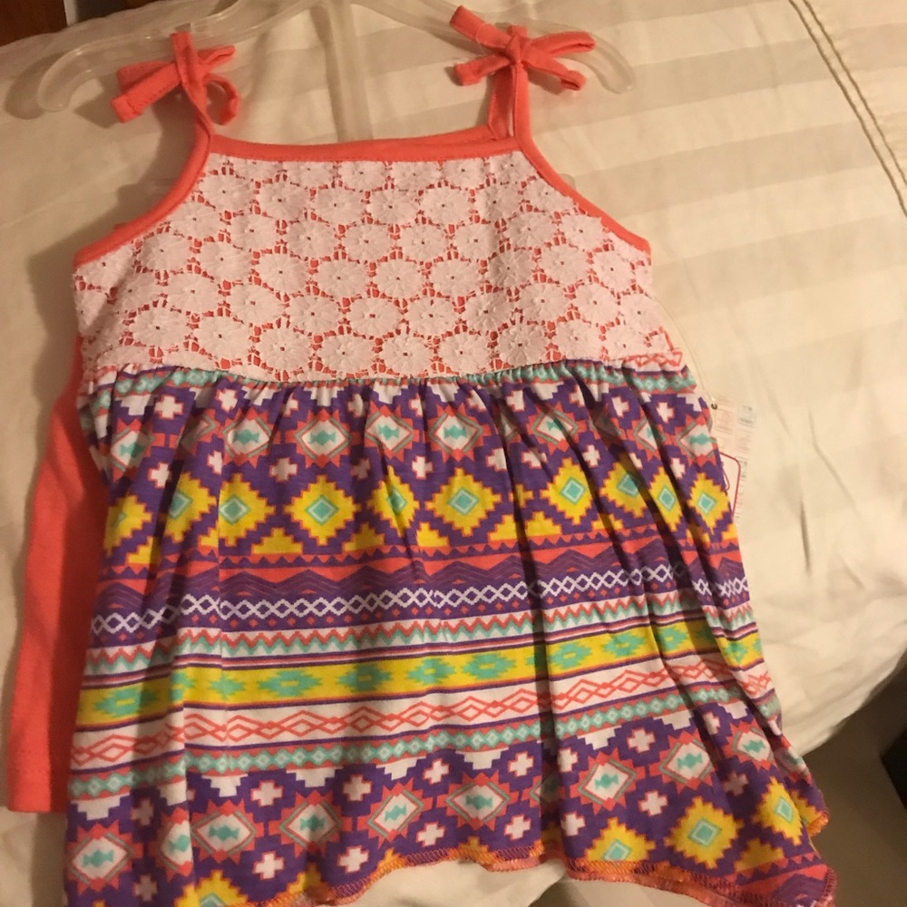 Spaghetti strap long shirt with matching shorts.